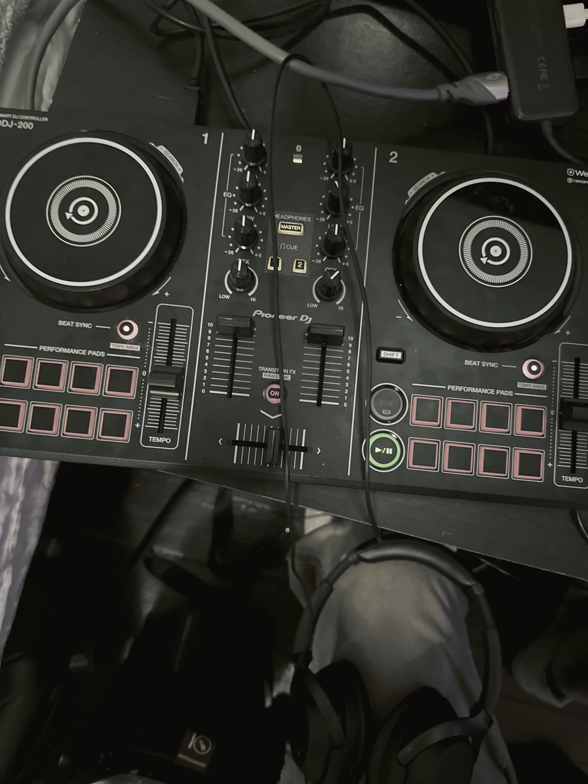 A DJ controller and headphones from above